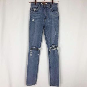 Reformation high rise skinnies distressed jeans